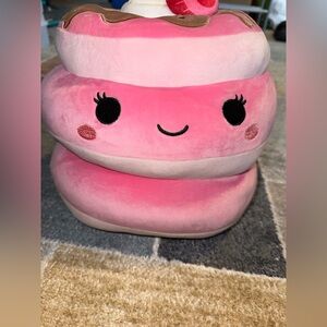 SquishCute Pink Smiling Plush Toy